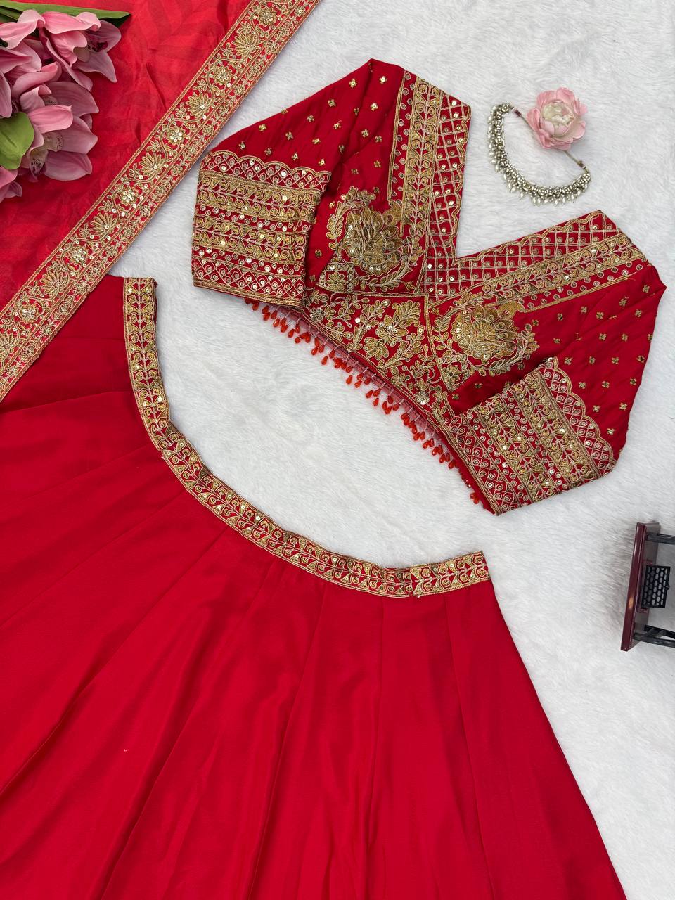 Regal Crimson Red Bridal Lehenga Choli Ensemble Featuring Intricate Gold Zari Embroidery, Heritage Motifs, and Embellished Tassels
